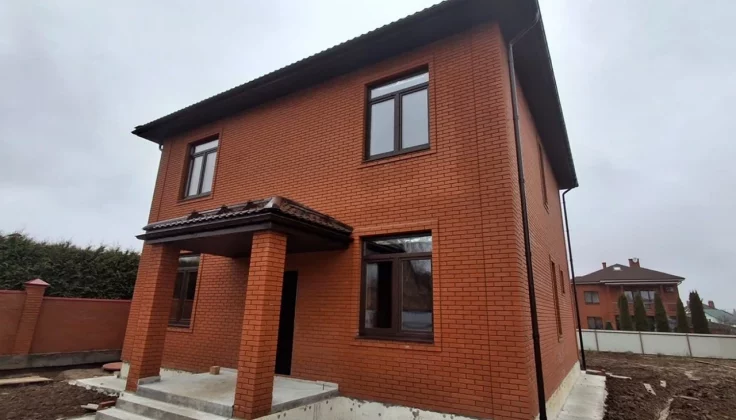 Двухэтажный дома из теплой керамики на ленточном фундаменте